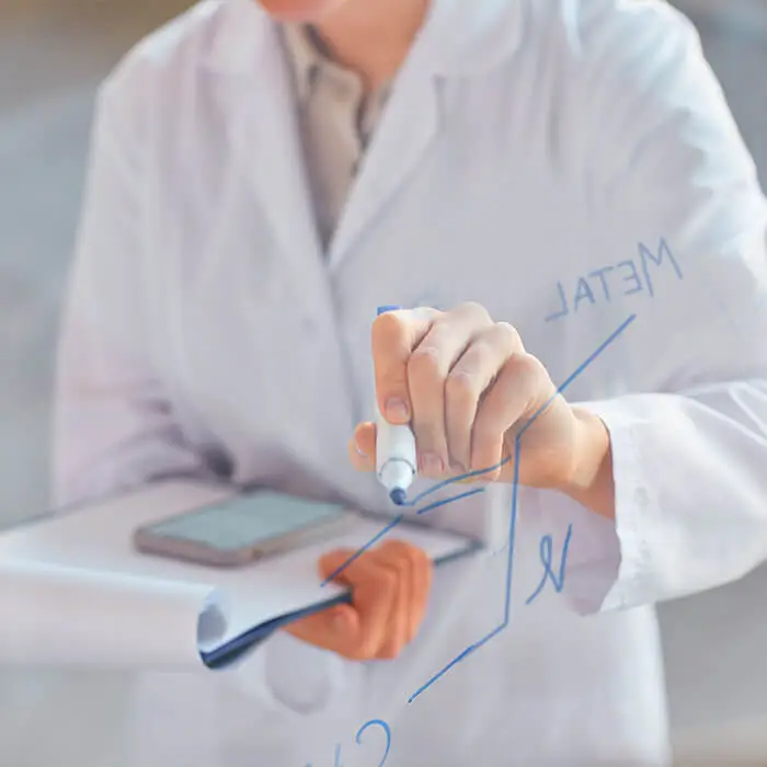 Scientist making laboratory notes